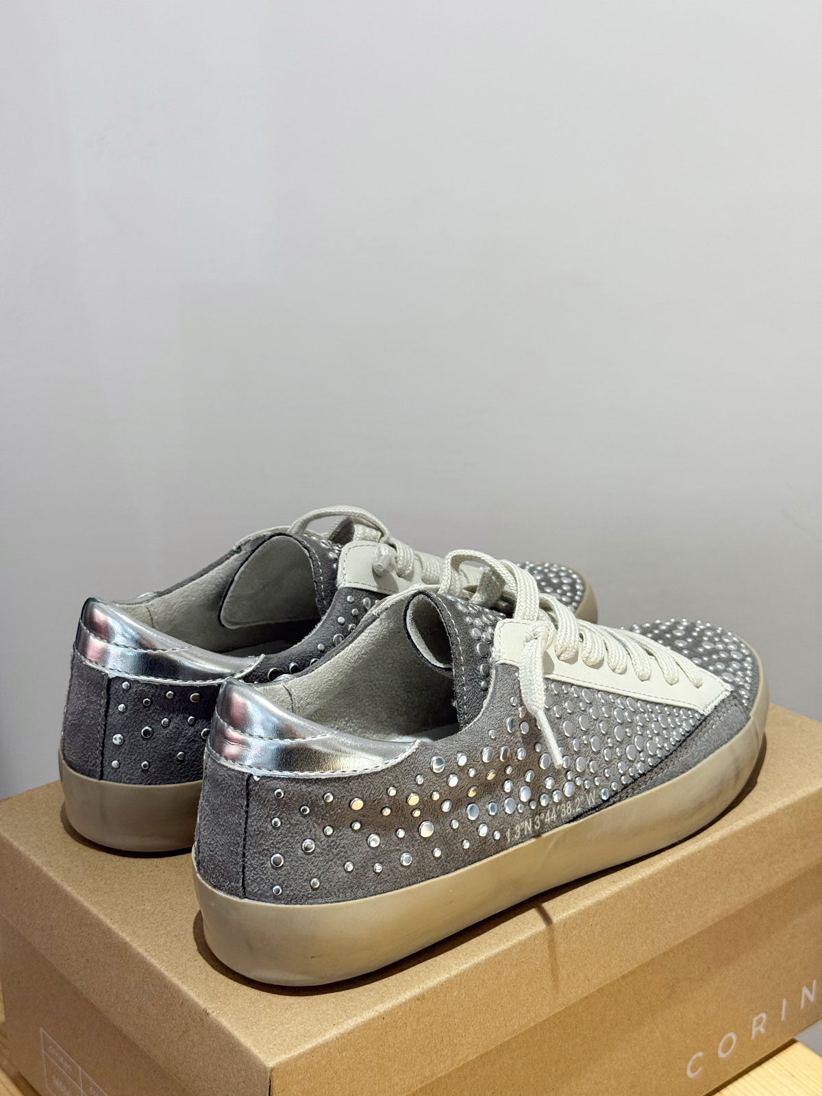 Zapatilla tachuelas