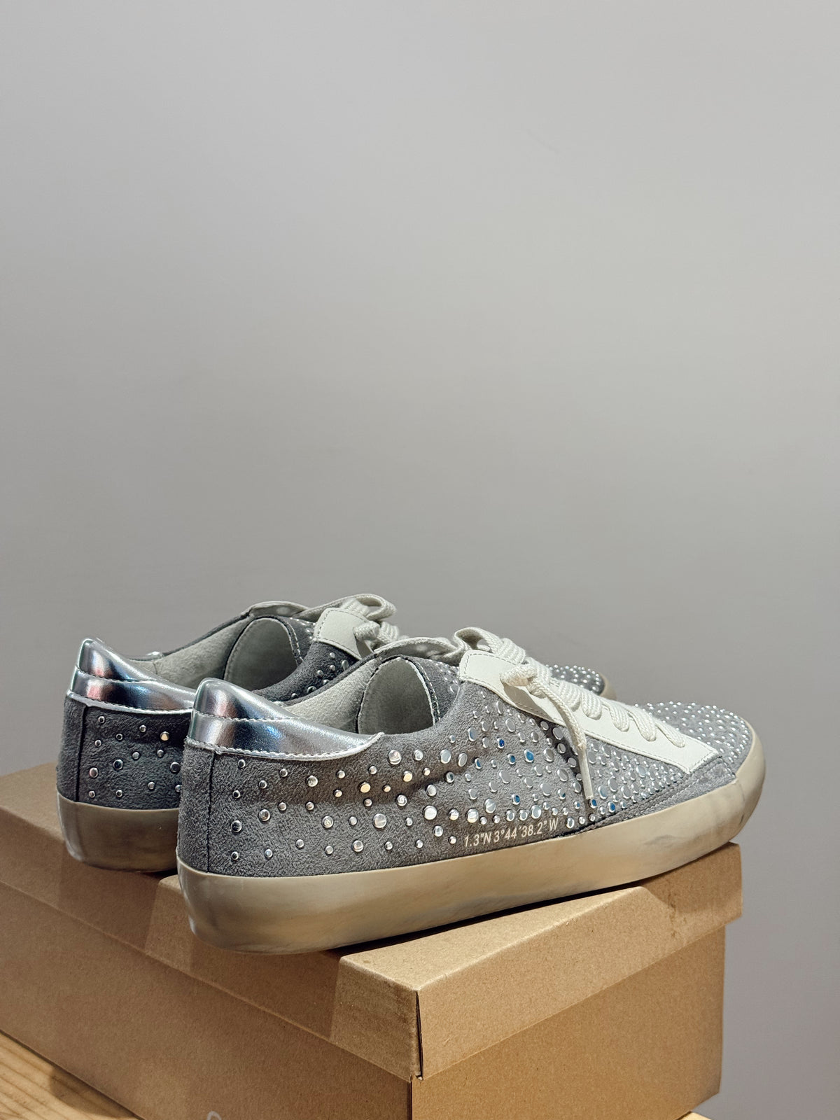 Zapatilla Tachuelas