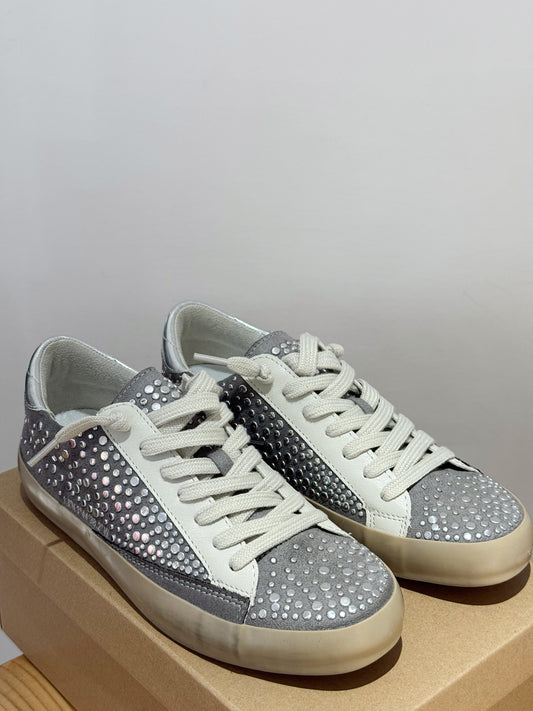 Zapatilla tachuelas
