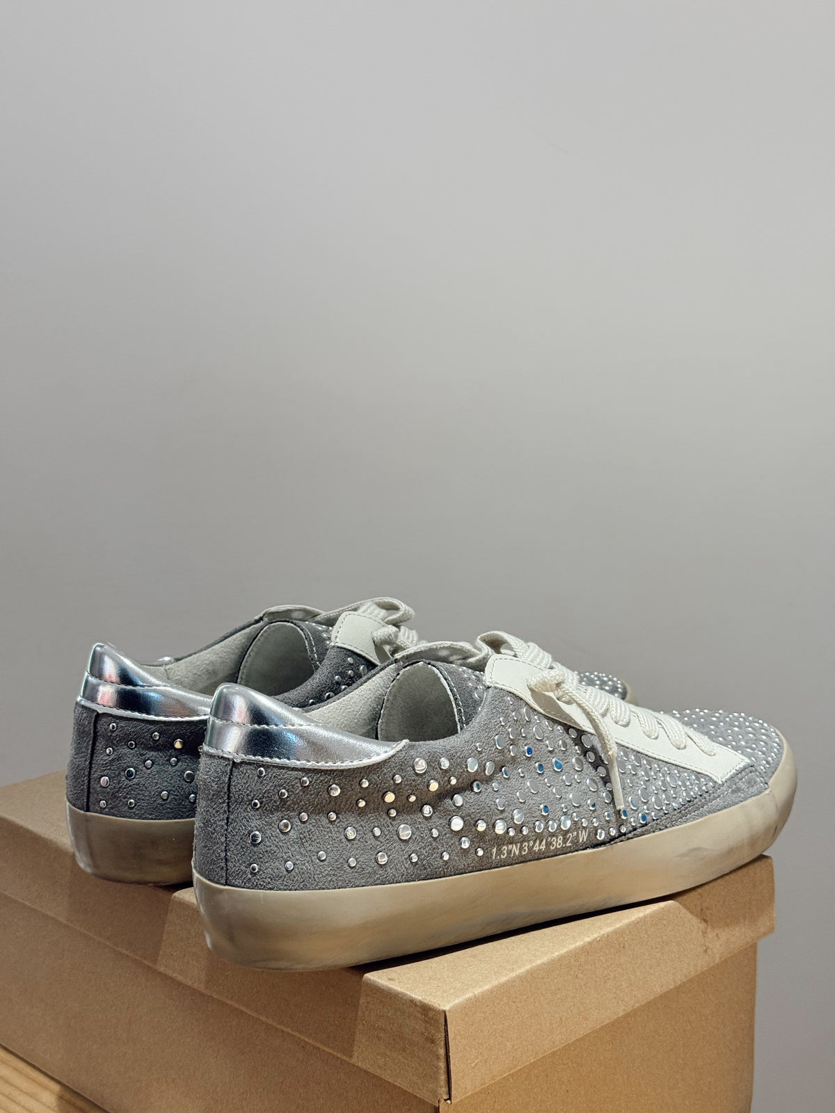 Zapatilla Tachuelas